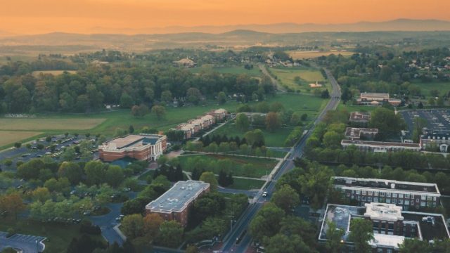 Drone photo of Bridgewater College campus during sunrise
