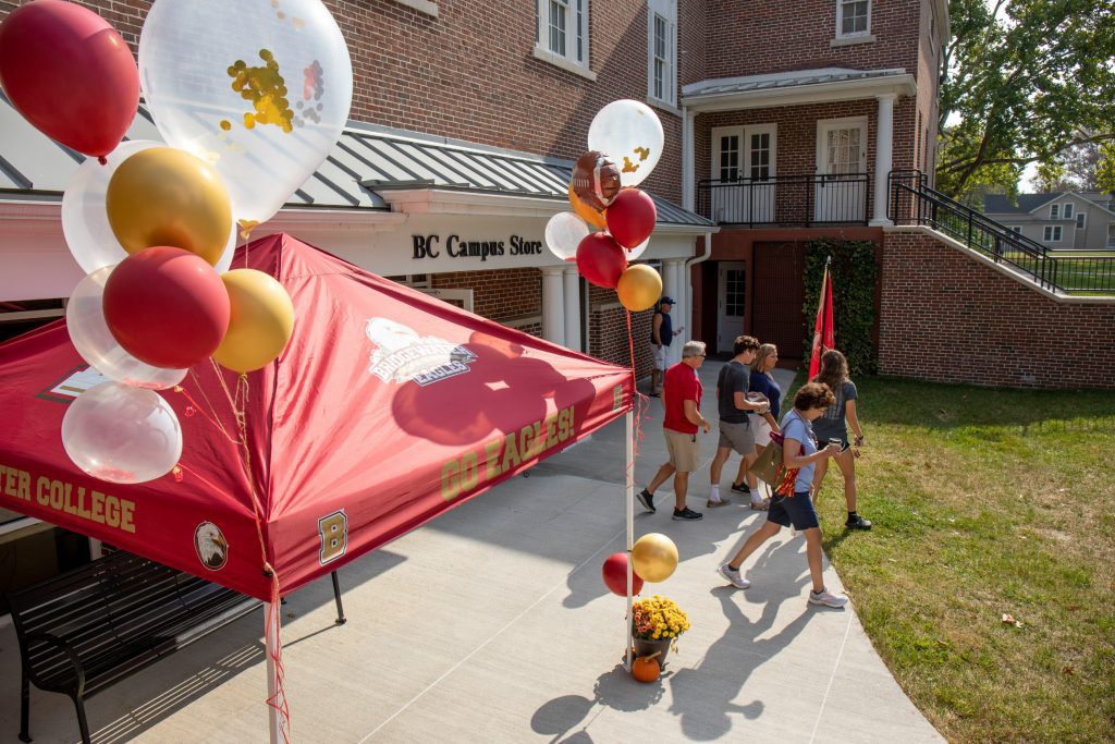 People leave the campus bookstore