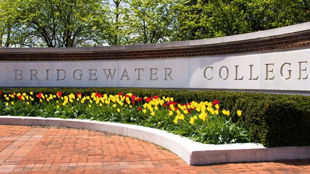 Tulips bloom in front of Bridgewater College sign