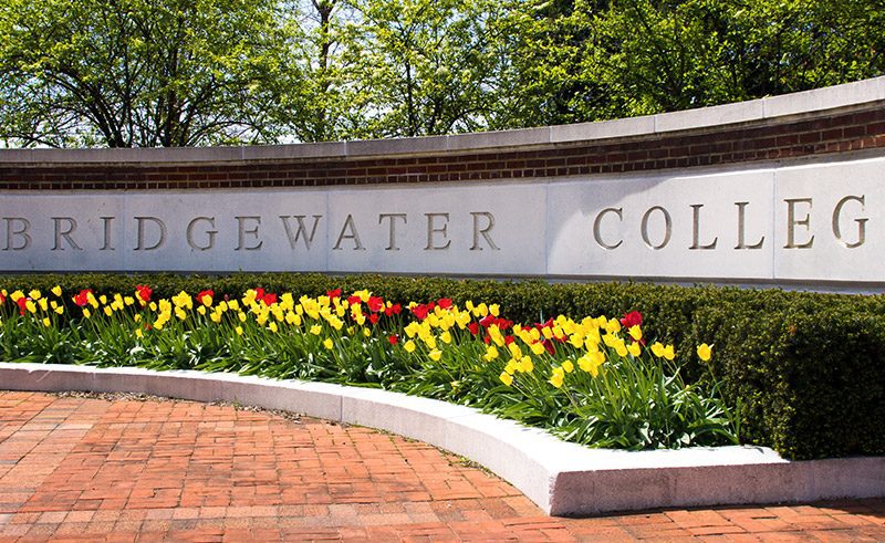 Tulips bloom in front of Bridgewater College sign