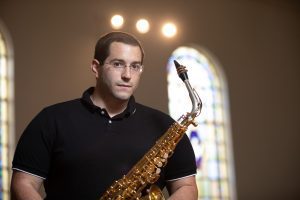 Anthony Cincotta holding saxophone