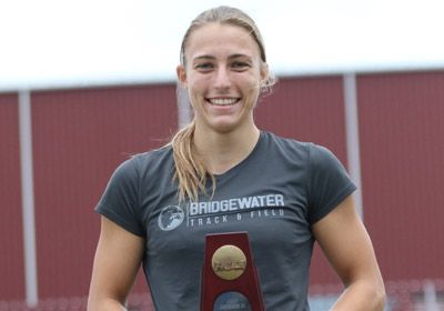 Amber Celen holds an award|Amber Celen holds an award|Amber Celen holds an award