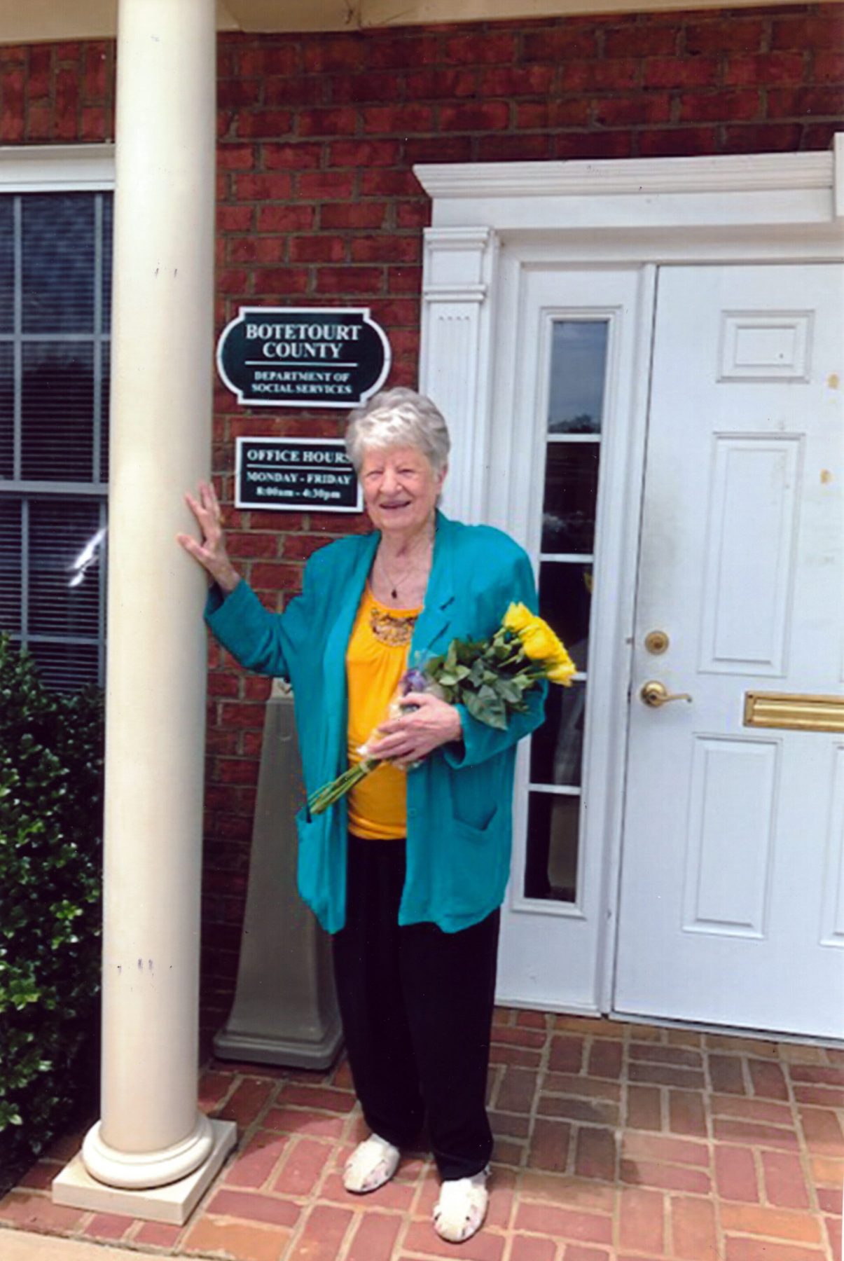 Woman holds bouquet of flower