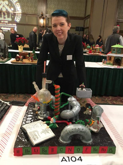 Meghan Morris with her gingerbread house