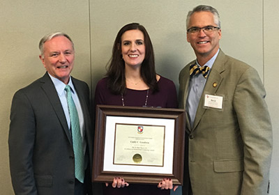 Photo of Emily Goodwin with the award