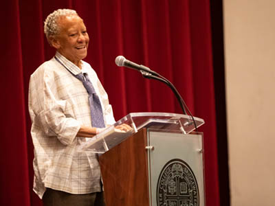 Nikki Giovanni speaks at podium||Nikki Giovanni