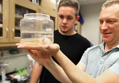 Professor and student in lab