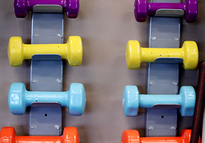 blue and orange dumbbells