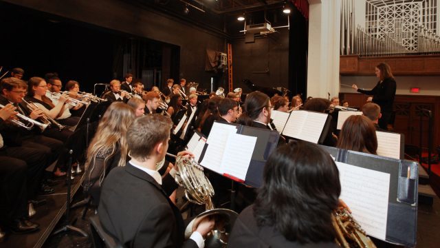 photo of symphonic band rehearsal conducted by Dr. Carrillo