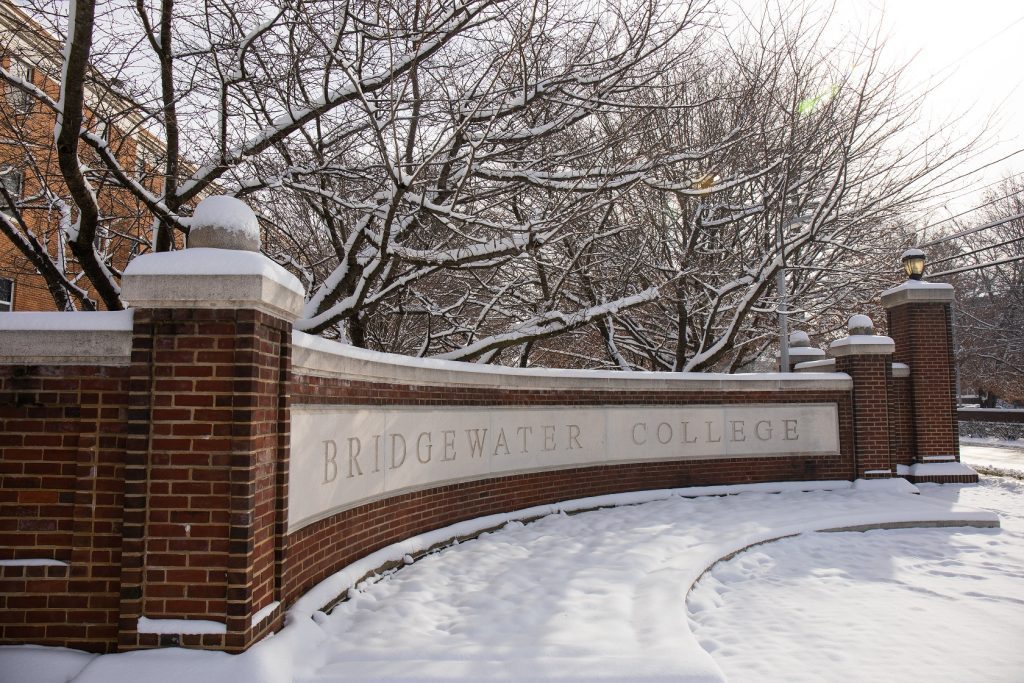 the Bridgewater College cornerstone covered in snow