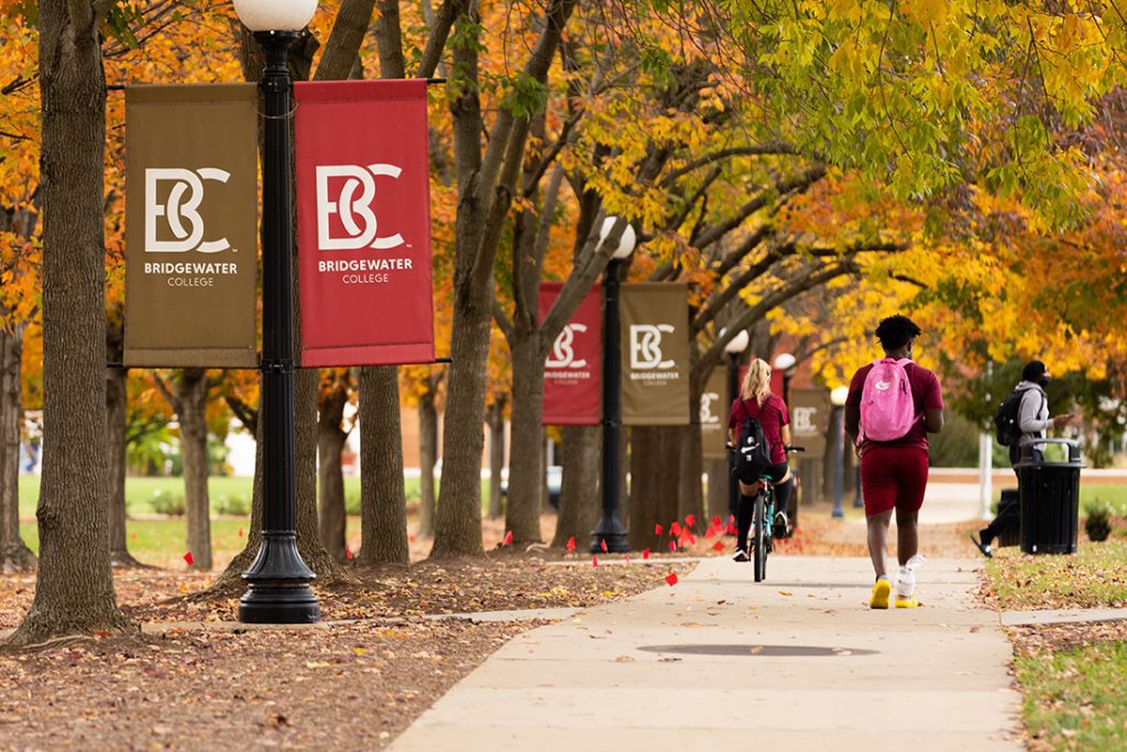 Students on Campus with Bridgewater College banners