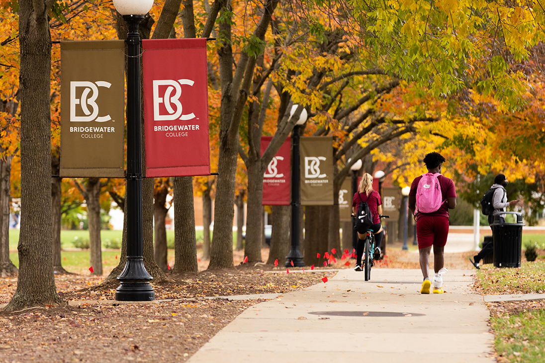 Students on Campus with Bridgewater College banners