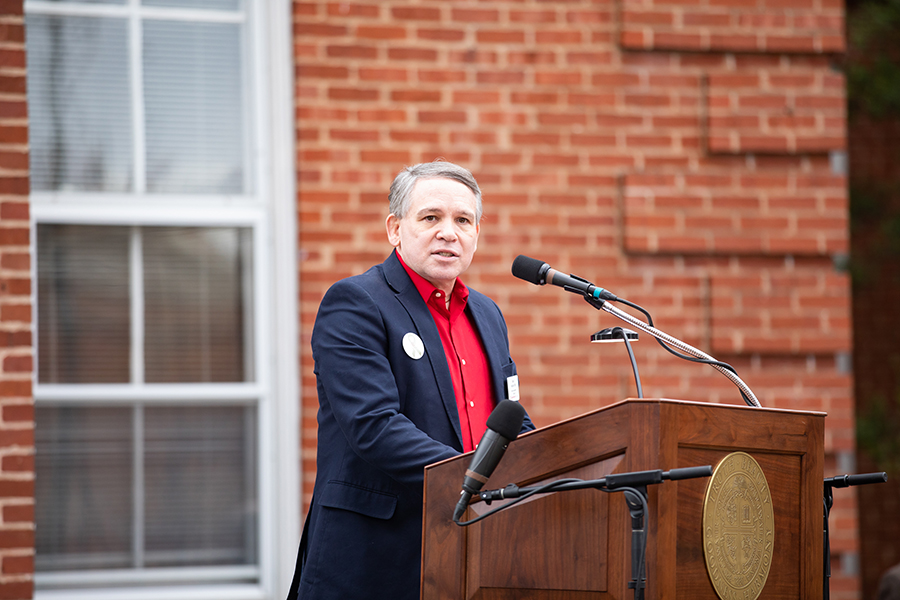 Alumni Association President Bradley Hallock '86 speaks to the crowd