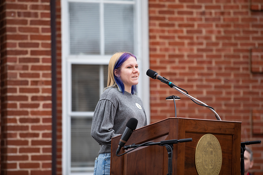 Senior Renee Polome speaks to the crowd 