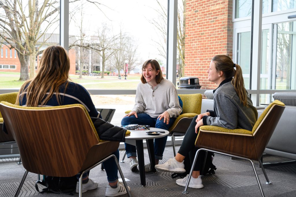 Group sitting in a circle talking