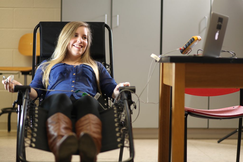 Person reclined in a chair for testing for a psychology class