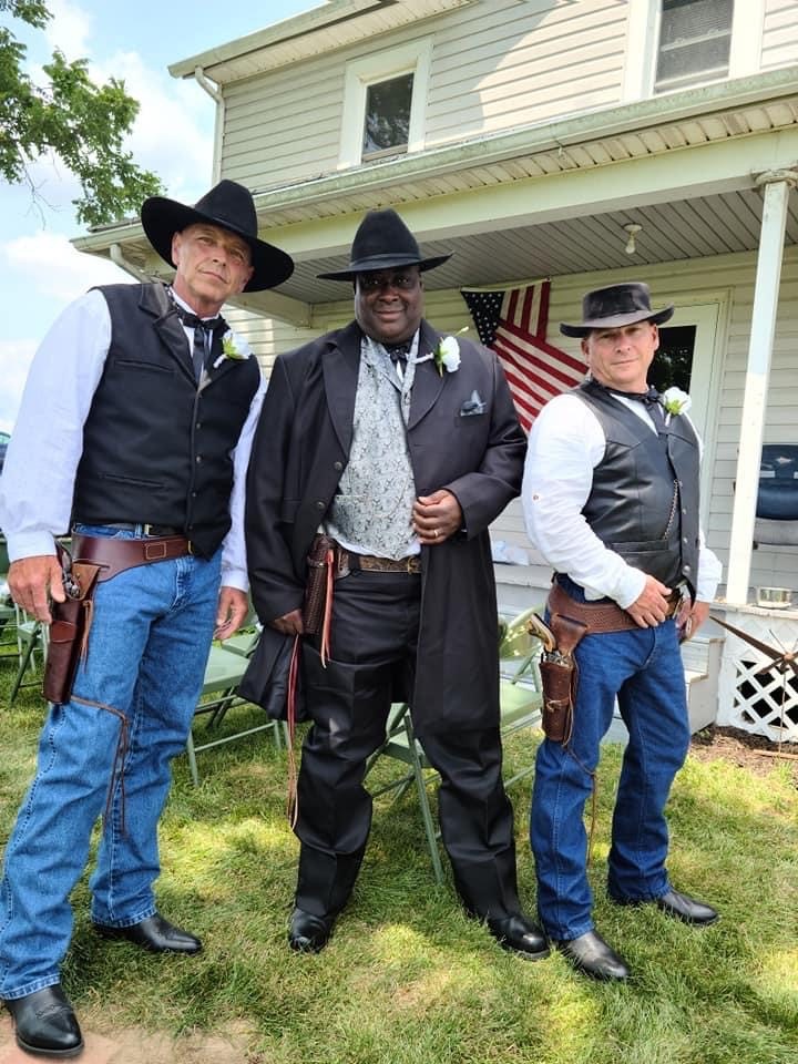 Campus Police Officer John Painter, left, and Campus Police Officer Kelly Zander, right, with Campus Safety Officer Vashon “J.J.” Jefferson, middle, at his wedding 