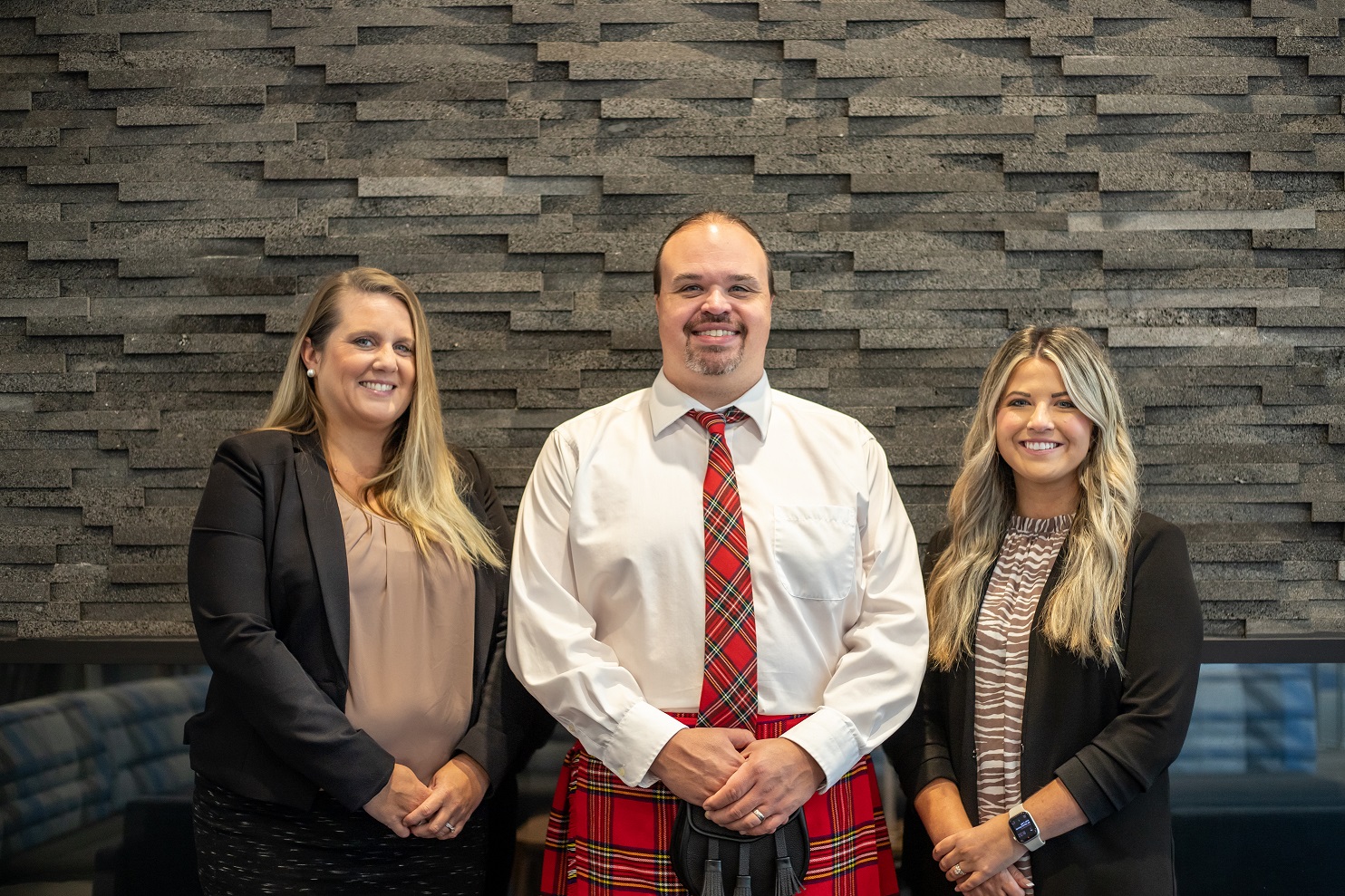 Three certified staff members from Bridgewater College’s Financial Aid Department, from left, Associate Director of Financial Aid Betsy Henderson, Director of Financial Aid Joshua North and Financial Aid Counselor Tori Pullin.