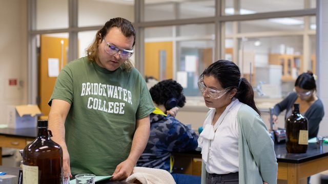 Student and professor working together in a lab