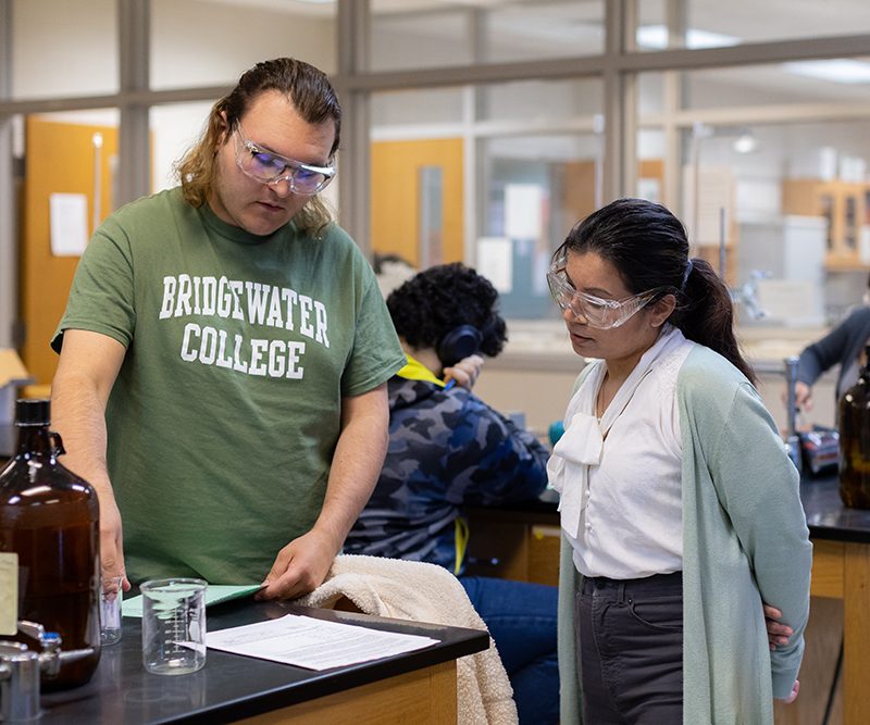 Student and professor working together in a lab