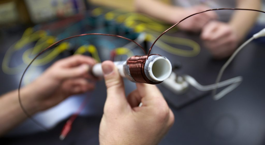 Student working with materials in lab