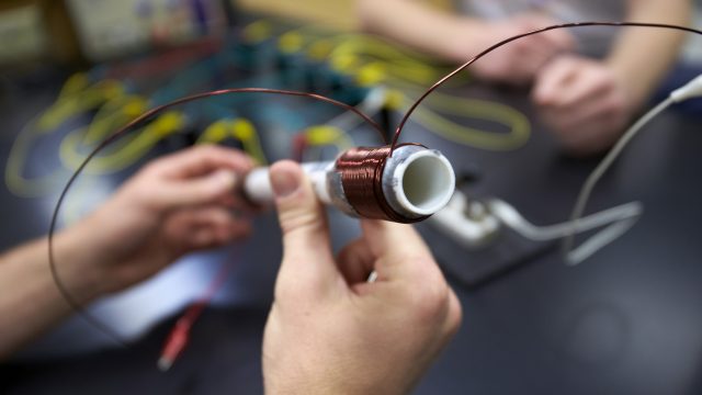 Student working with materials in lab