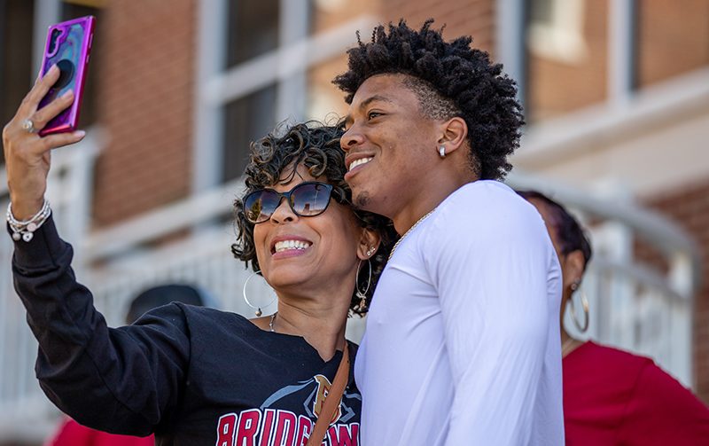 Man and woman smiling for a selfie