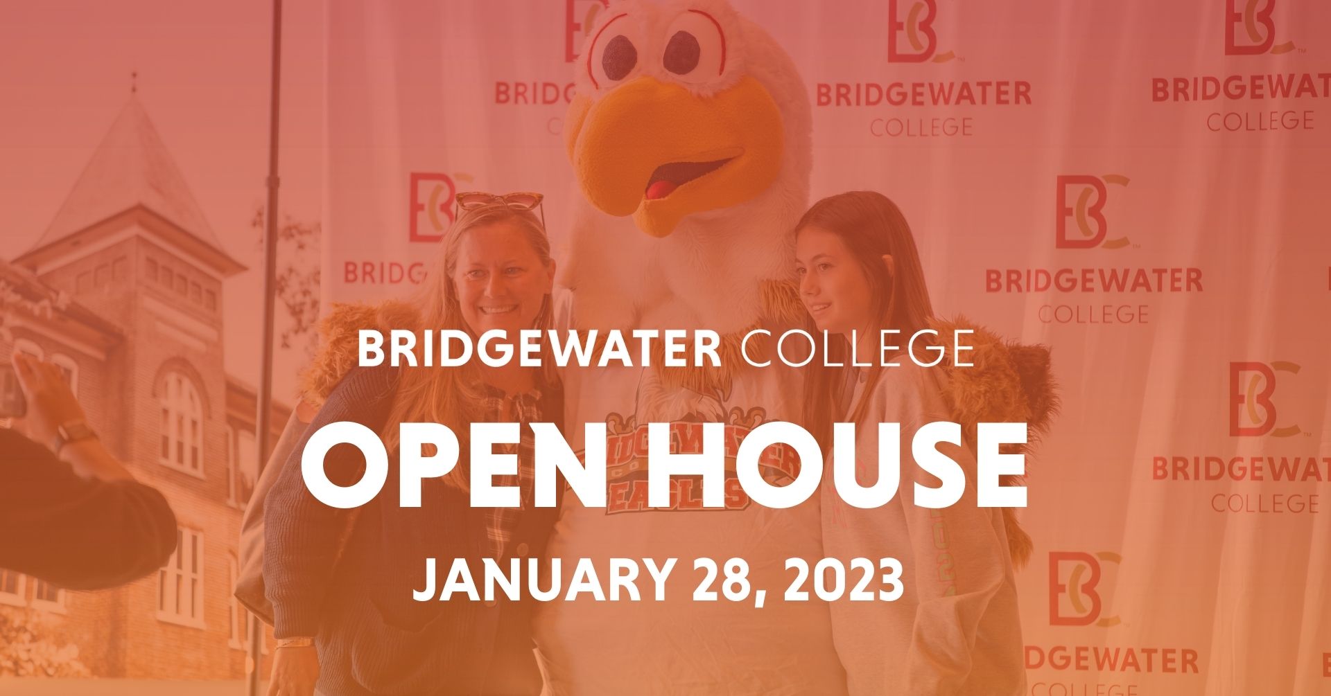 Family posing with mascot, Ernie at Open House with text overlay - Bridgewater College; Open House; January 28, 2023.