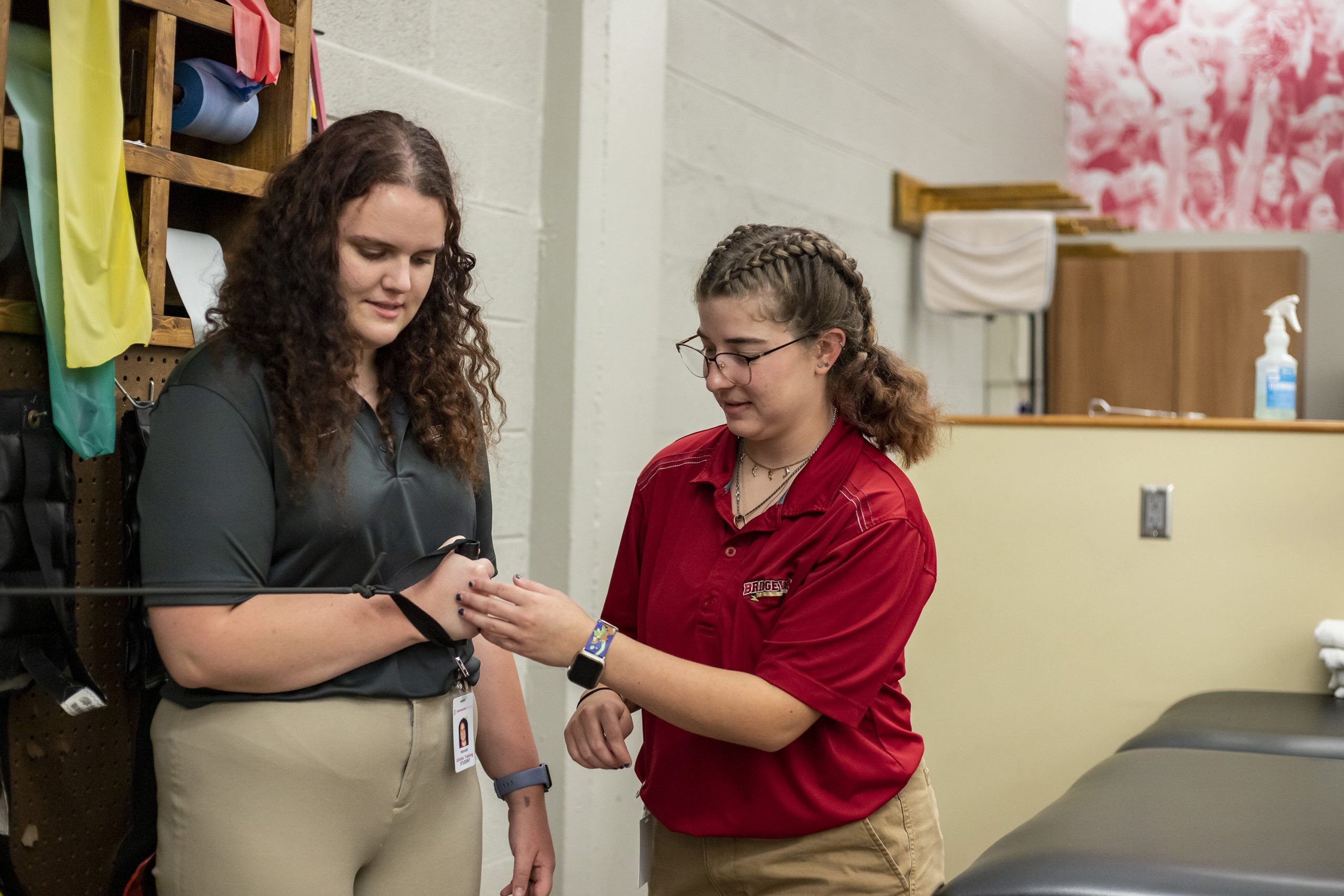 Athletic training students working in a clinical environment