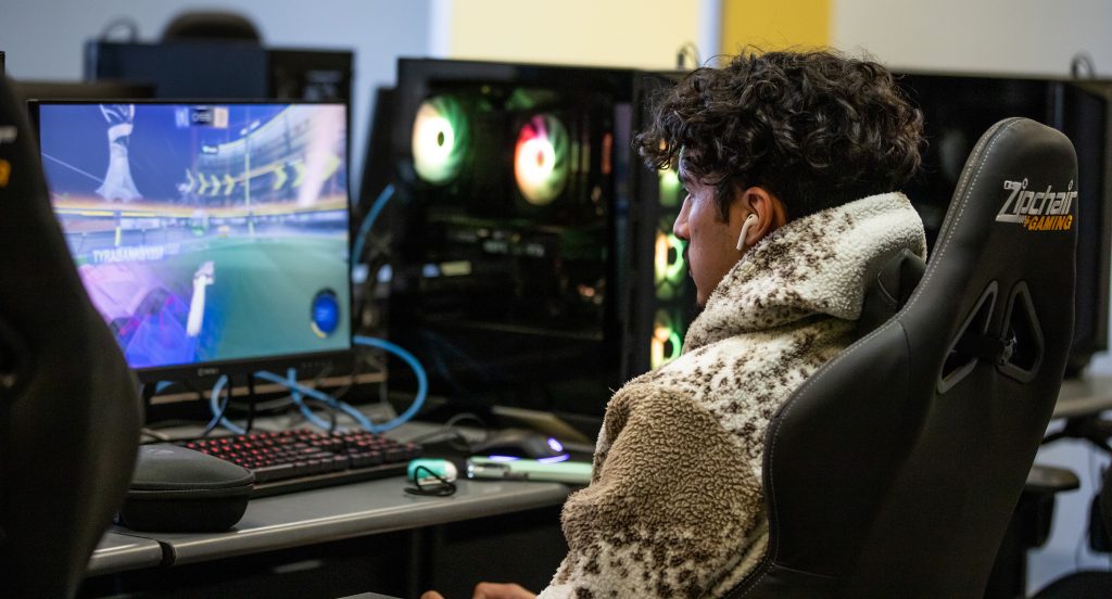 Student playing rocket league in the e-sports space