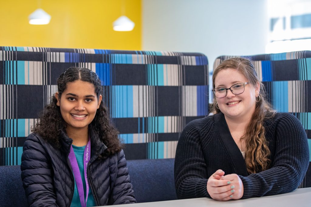 Bridgewater College students Jordan Hall and Katelyn Harrison sit together in the Forrer Learning Commons