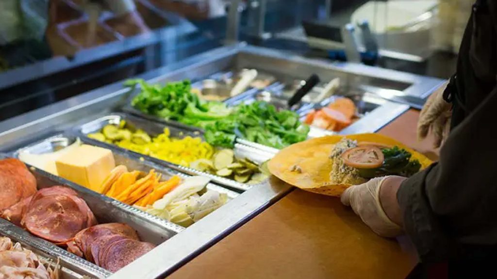 wrap station with meats, chesses, lettuce and other ingredients