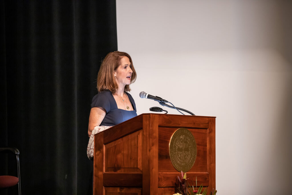 Lynn Novick speaking at a podium