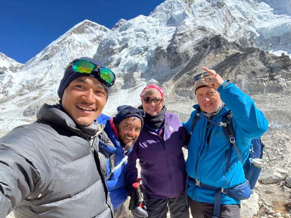 Ashley and Ann Smith with their hiking guides at Mount Everest Base Camp