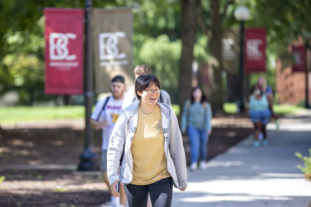 Student walking to class on campus