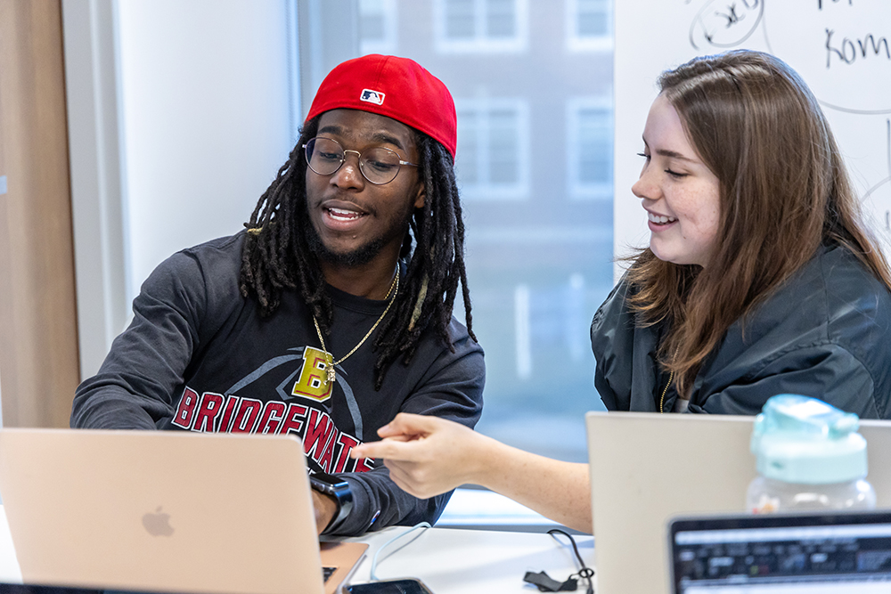 Two students working together in human resources class