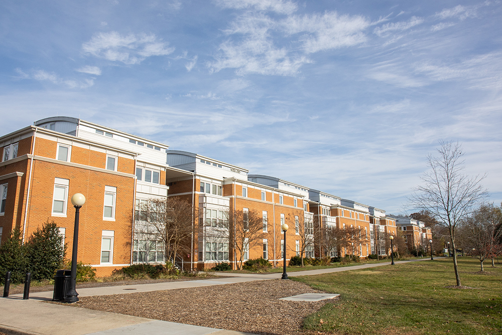 Outside of the Wampler Towers on a partly cloudy day