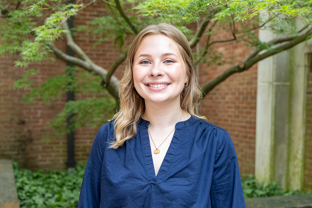 Maggie Demasi portrait with tree in the background