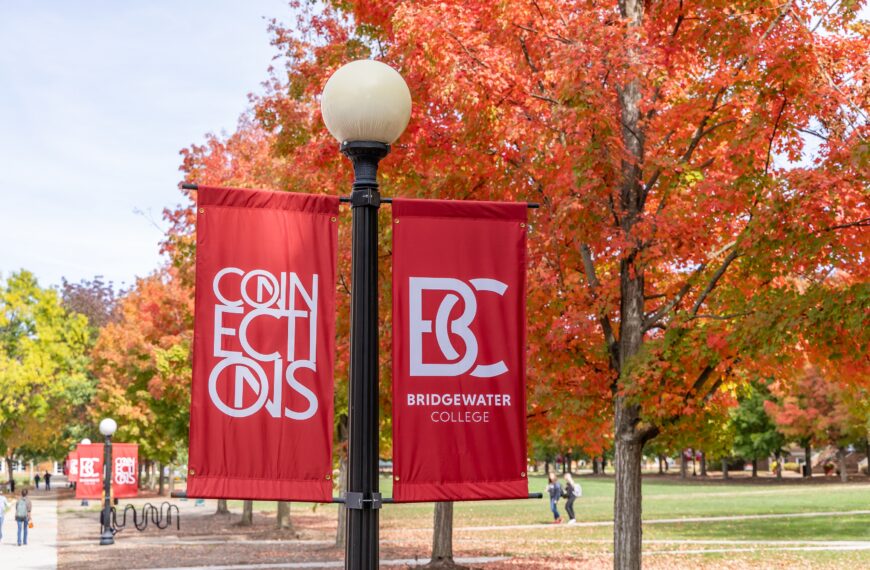 red banners that read B-C Bridgewater College and Connections. A fall tree is behind the banners