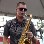 Tim Stuart playing the saxophone 