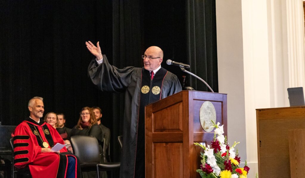 The Rev. Wil Nolen gestures while delivering his address