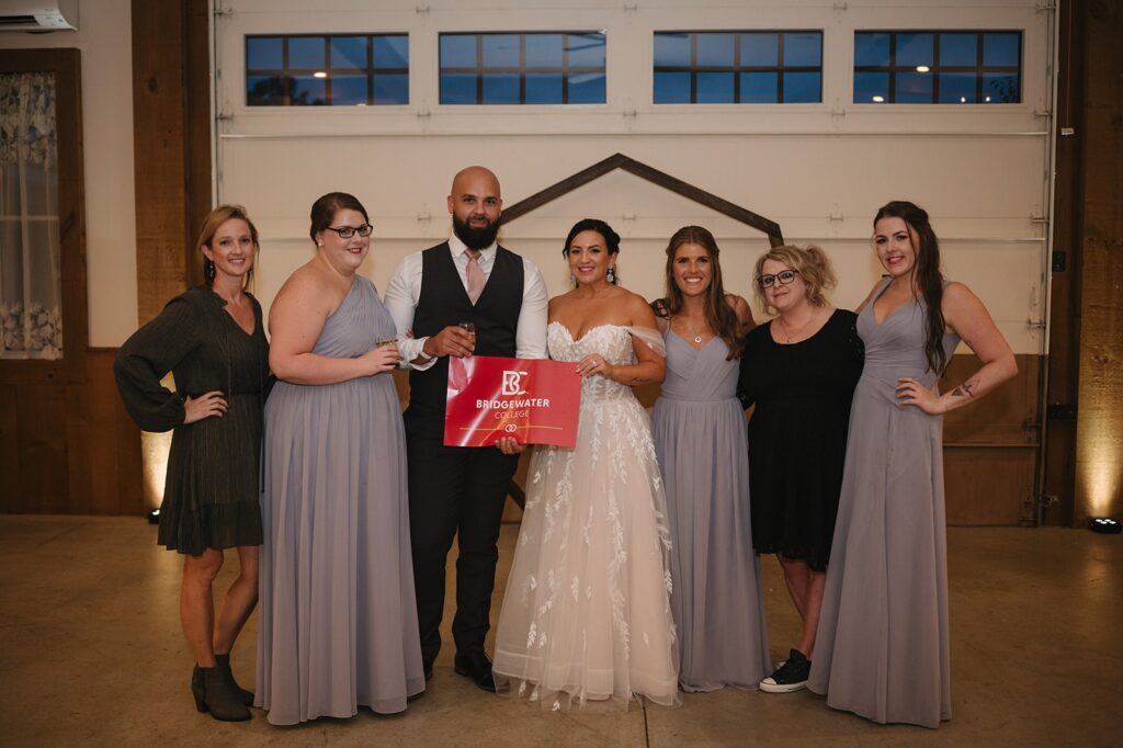 Stacey Scott and husband Matthew Sosa at their wedding pictured with fellow B-C alumni