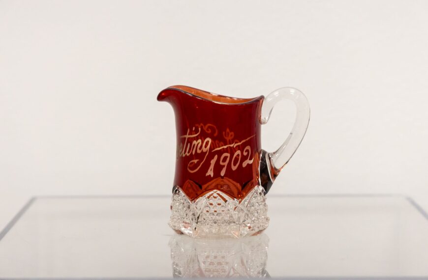 Miniature ruby ware glass pitcher, souvenir of the Brethren Annual Conference, 1902.