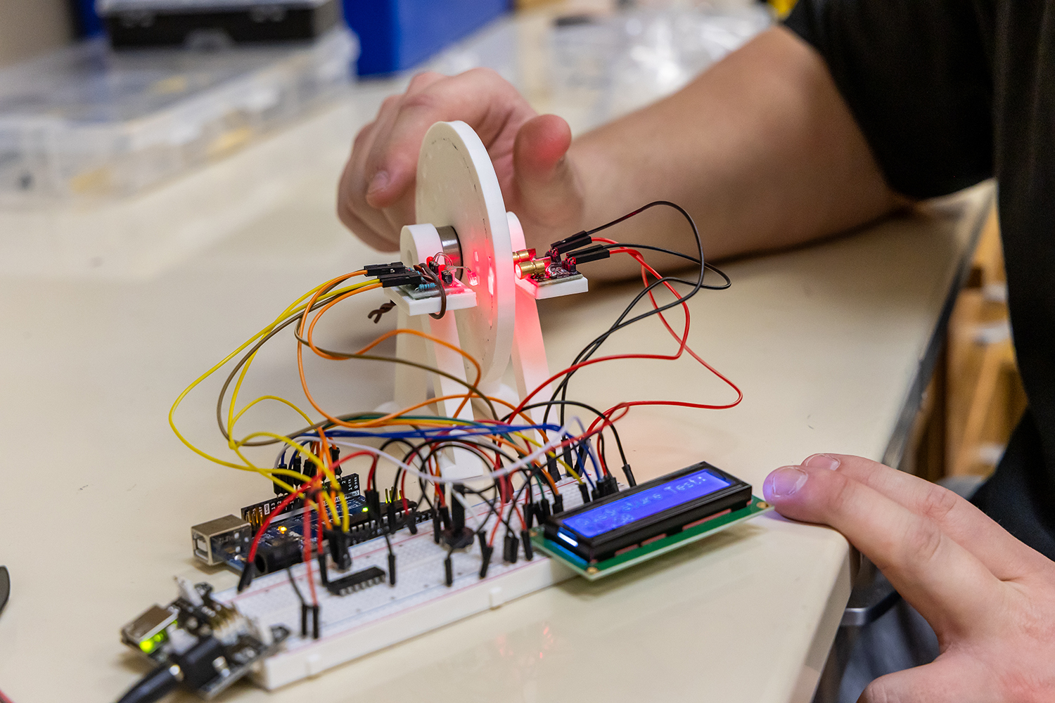 Student working with digital encoder