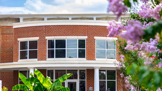 Nininger Hall framed with summer florals