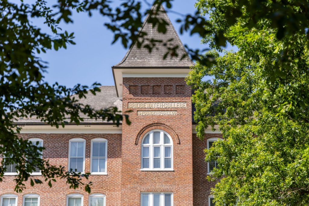 Flory Hall building with trees