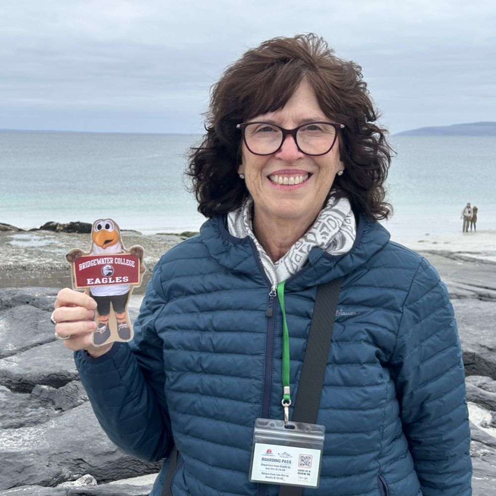 Flat Ernie with Laura MacPherson-McDonald '82 on Inis Oirr, Aran Islands, Ireland.  The beautiful clear Atlantic Ocean is in the background.