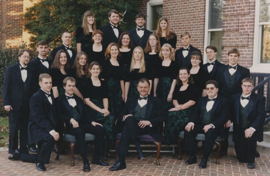 Jesse Hopkins surrounded by students