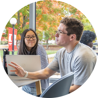 A student leads the conversation in a study group