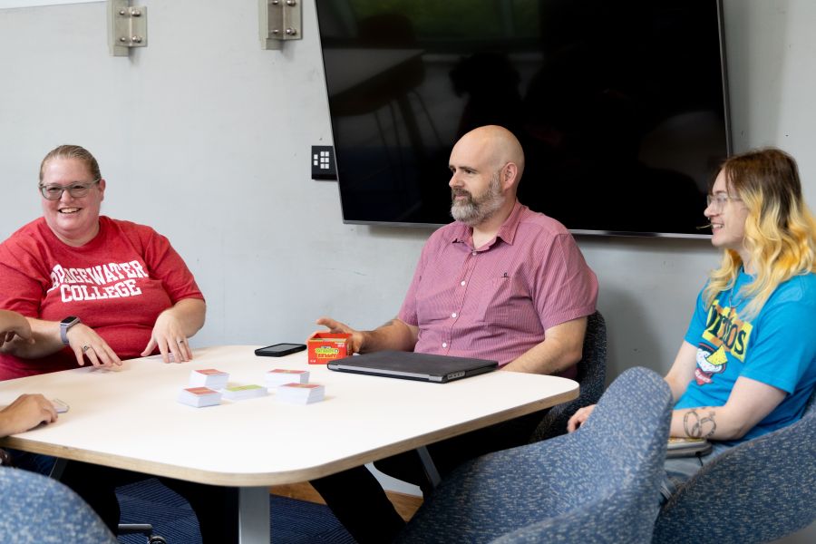 Student and professor playing Apples to Apples